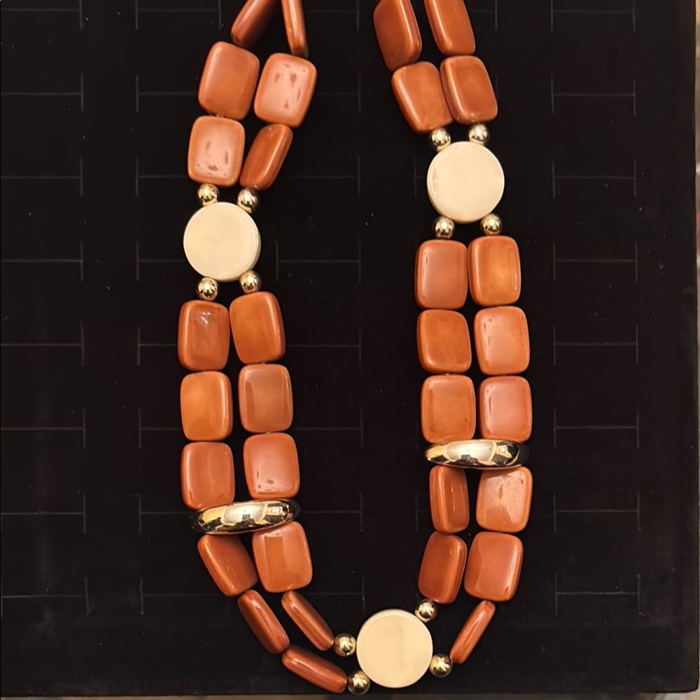 Elegant Orange and Cream Beaded Necklace with silver accents